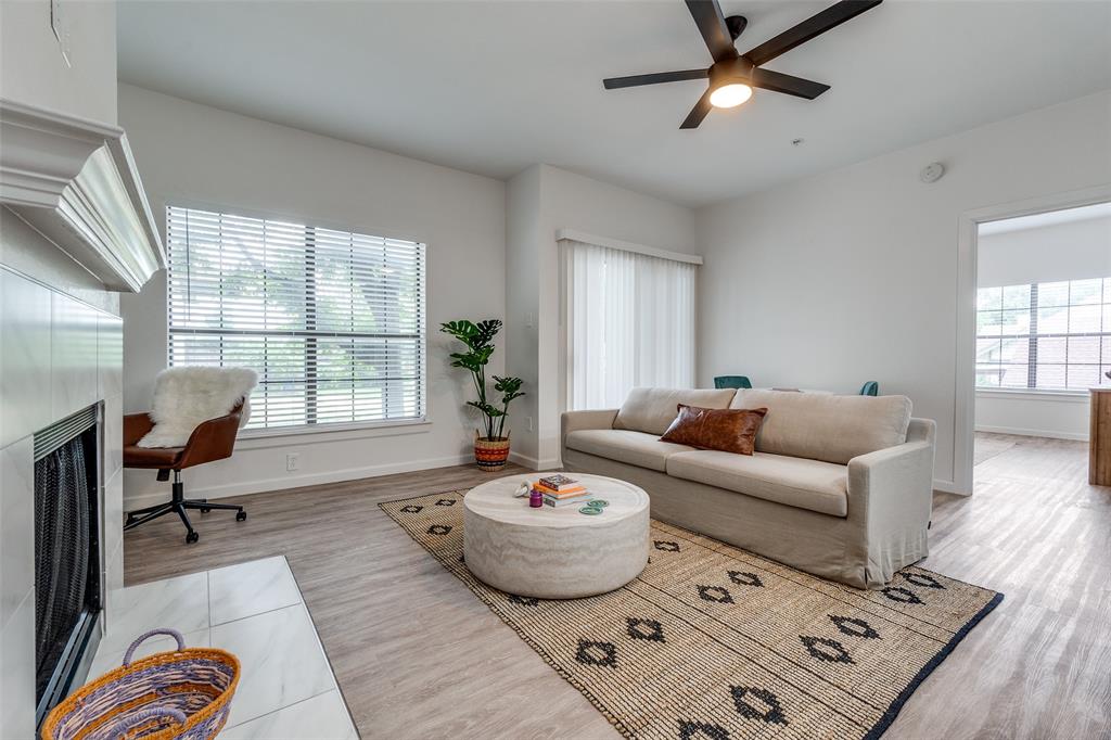 6003 Oram Street, Unit 203 Dallas, TX 75206 - Photo 2 of 25 a living room with furniture and a window