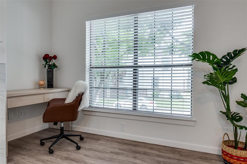 6003 Oram Street, Unit 203 Dallas, TX 75206 - Photo 7 of 25 a view of a workspace with furniture and a window