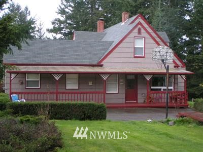 125 Allman Road Winlock, WA 98596 - Photo 1 of 1 a front view of a house with garden