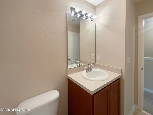 a bathroom with a sink and a toilet