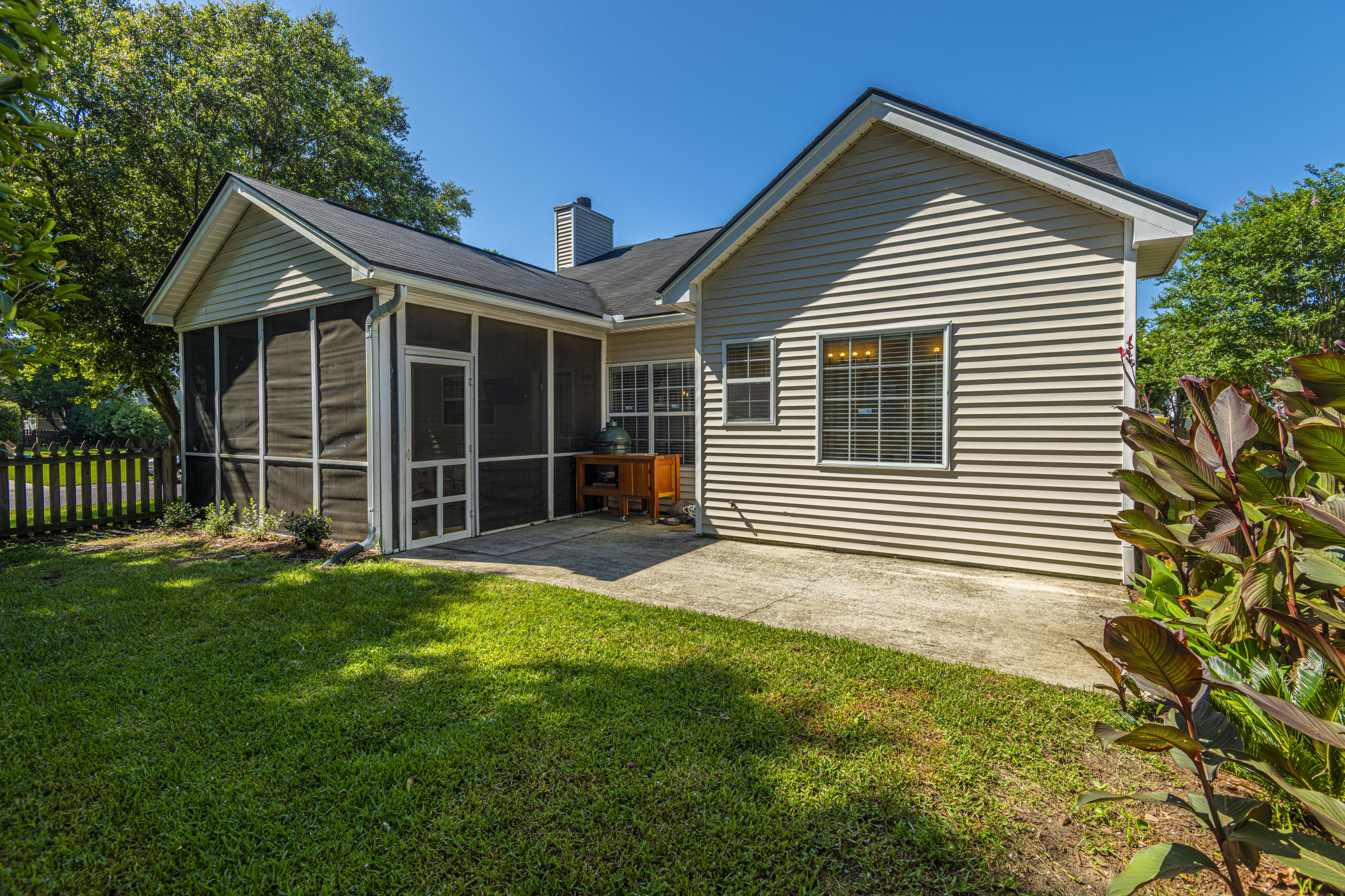 352 Rice Bay Drive Mount Pleasant, SC 29464 - Photo 2 of 38 Fenced Backyard with Screened Porch