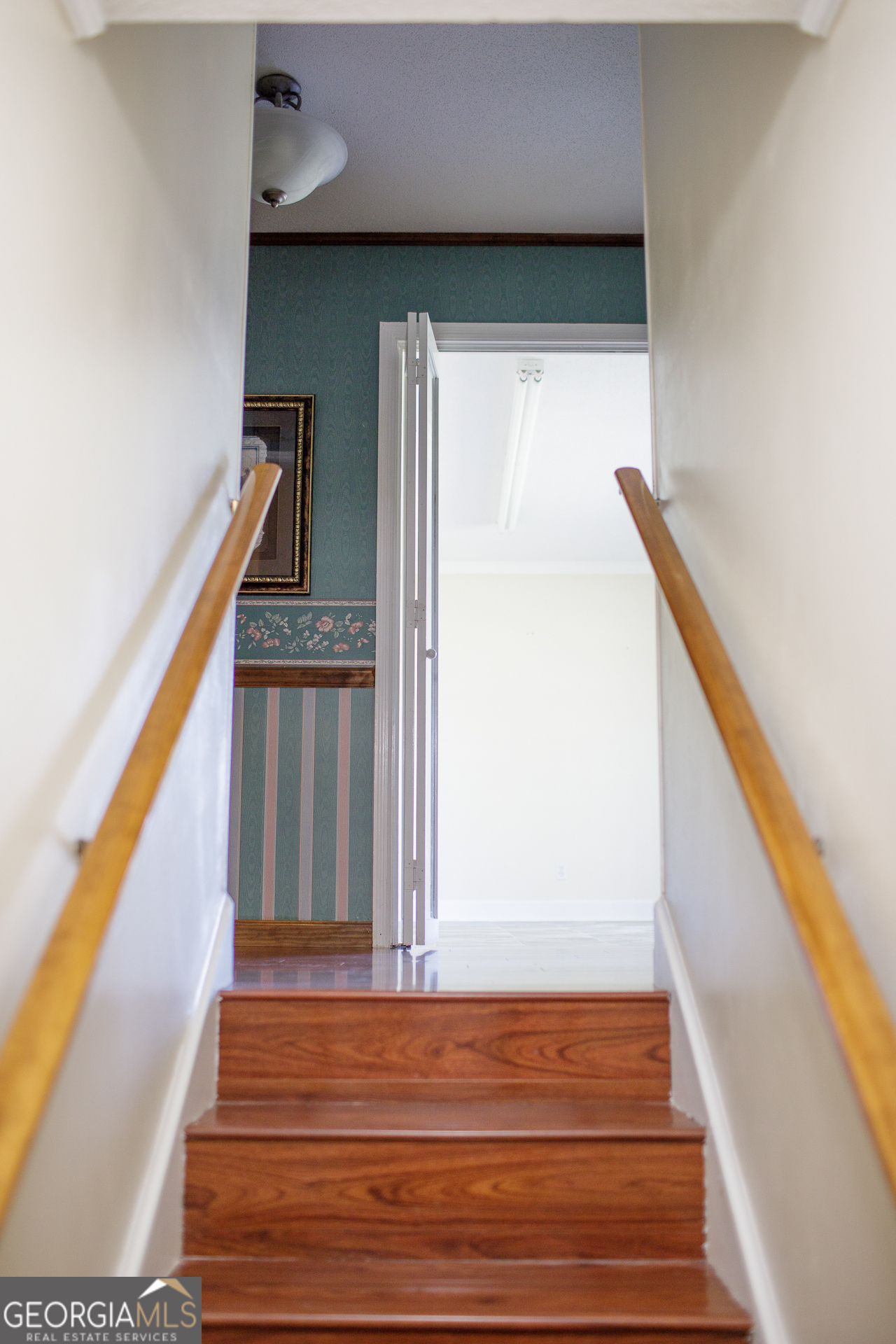 2110 Ware Street Blackshear, GA 31516 - Photo 35 of 57 a view of a stairs and an entryway