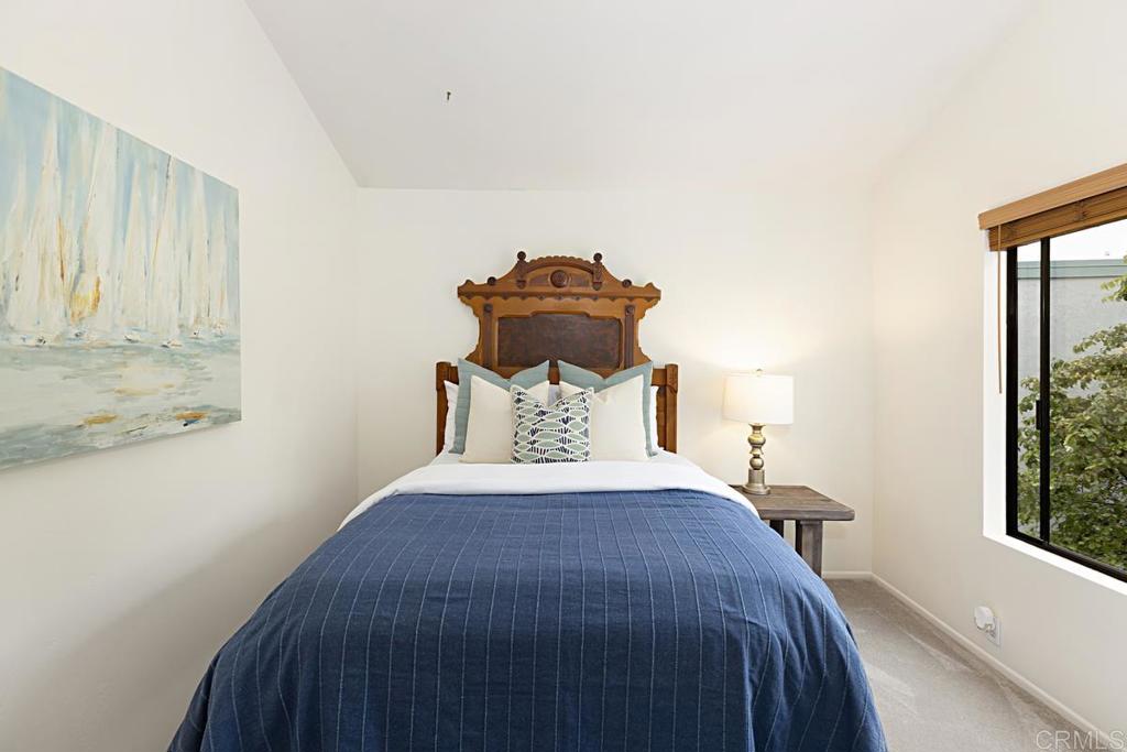 3242 Via Alicante La Jolla, CA 92037 - Photo 14 of 27 a bedroom with a bed and a window