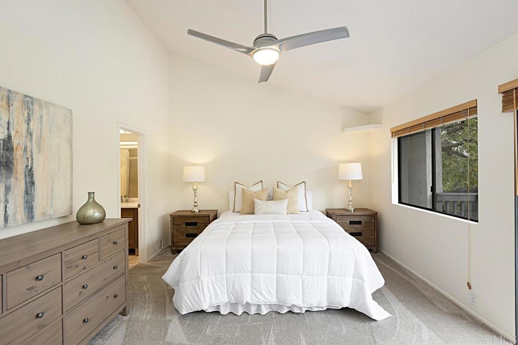 3242 Via Alicante La Jolla, CA 92037 - Photo 18 of 27 a bedroom with a bed and window