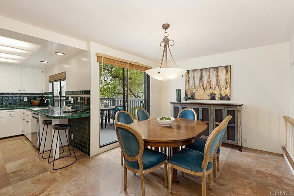 3242 Via Alicante La Jolla, CA 92037 - Photo 7 of 27 a view of a dining room with furniture window and outside view