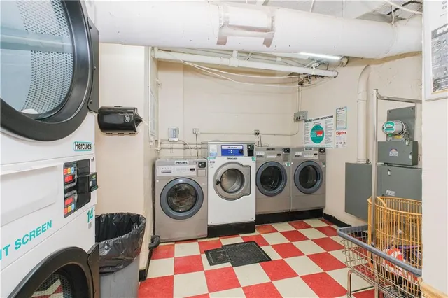 a utility room with dryer and washer
