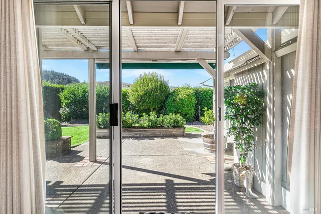 a view of a livingroom with furniture and a fireplace
