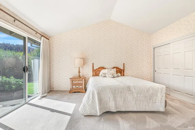 a bathroom with a sink double vanity and a bathtub