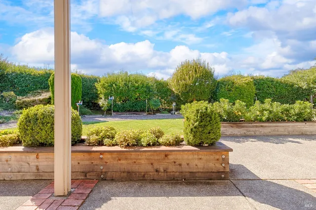 a view of swimming pool with a yard