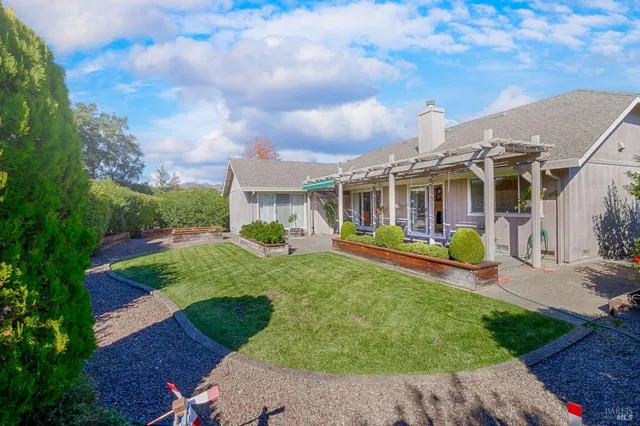 a view of house with outdoor space and porch