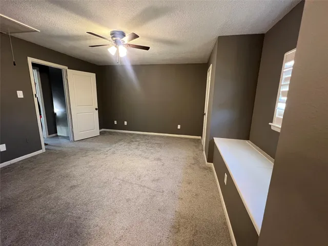wooden floor in an empty room with a mirror