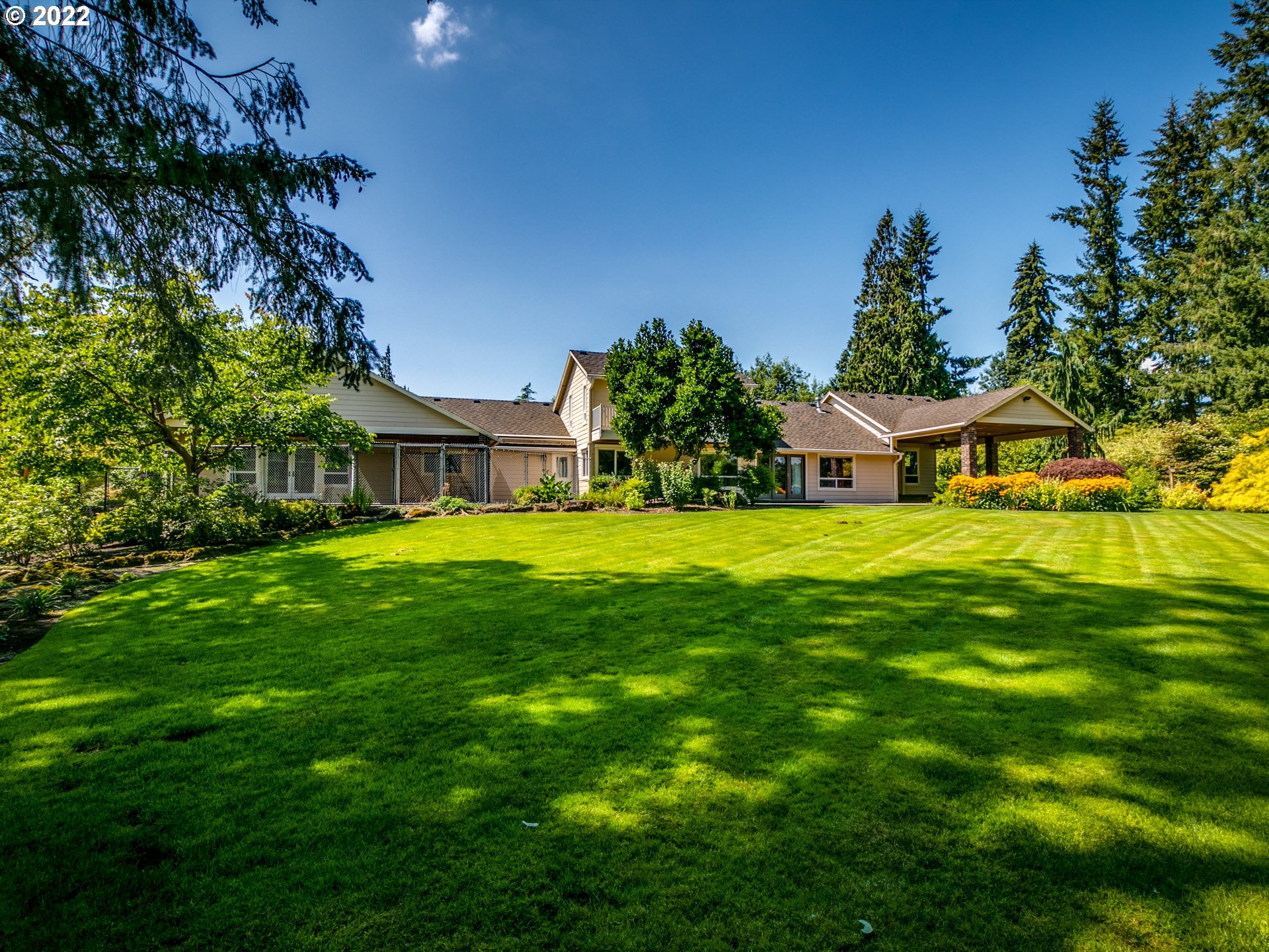 3515 Northwest 221st Street Ridgefield, WA 98642 - Photo 24 of 32 a front view of house with yard and green space
