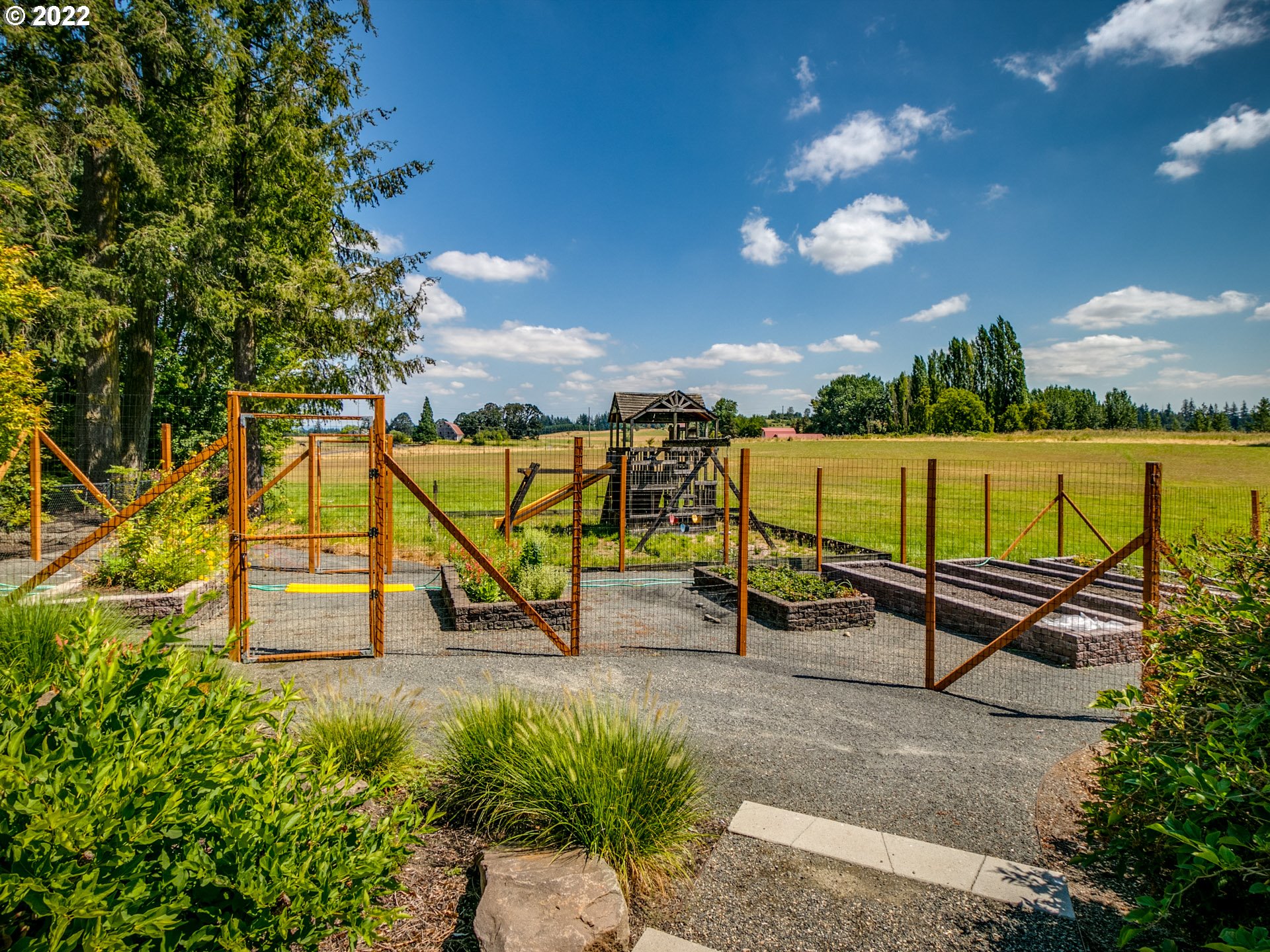 3515 Northwest 221st Street Ridgefield, WA 98642 - Photo 26 of 32 a view of a park with potted plants
