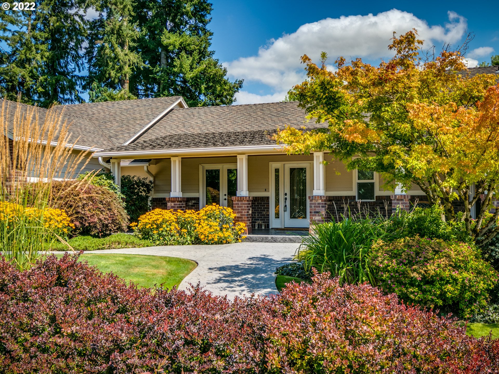 3515 Northwest 221st Street Ridgefield, WA 98642 - Photo 32 of 32 a front view of a house with garden