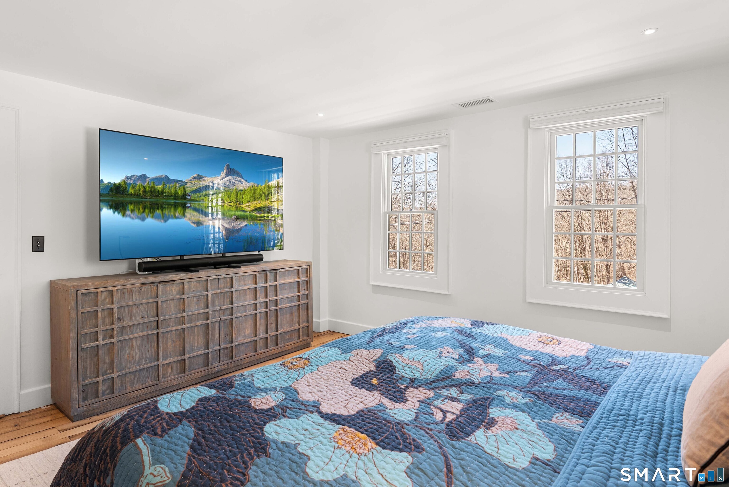 382 Weekeepeemee Road Woodbury, CT 06798 - Photo 30 of 40 a bedroom with furniture and flat screen tv