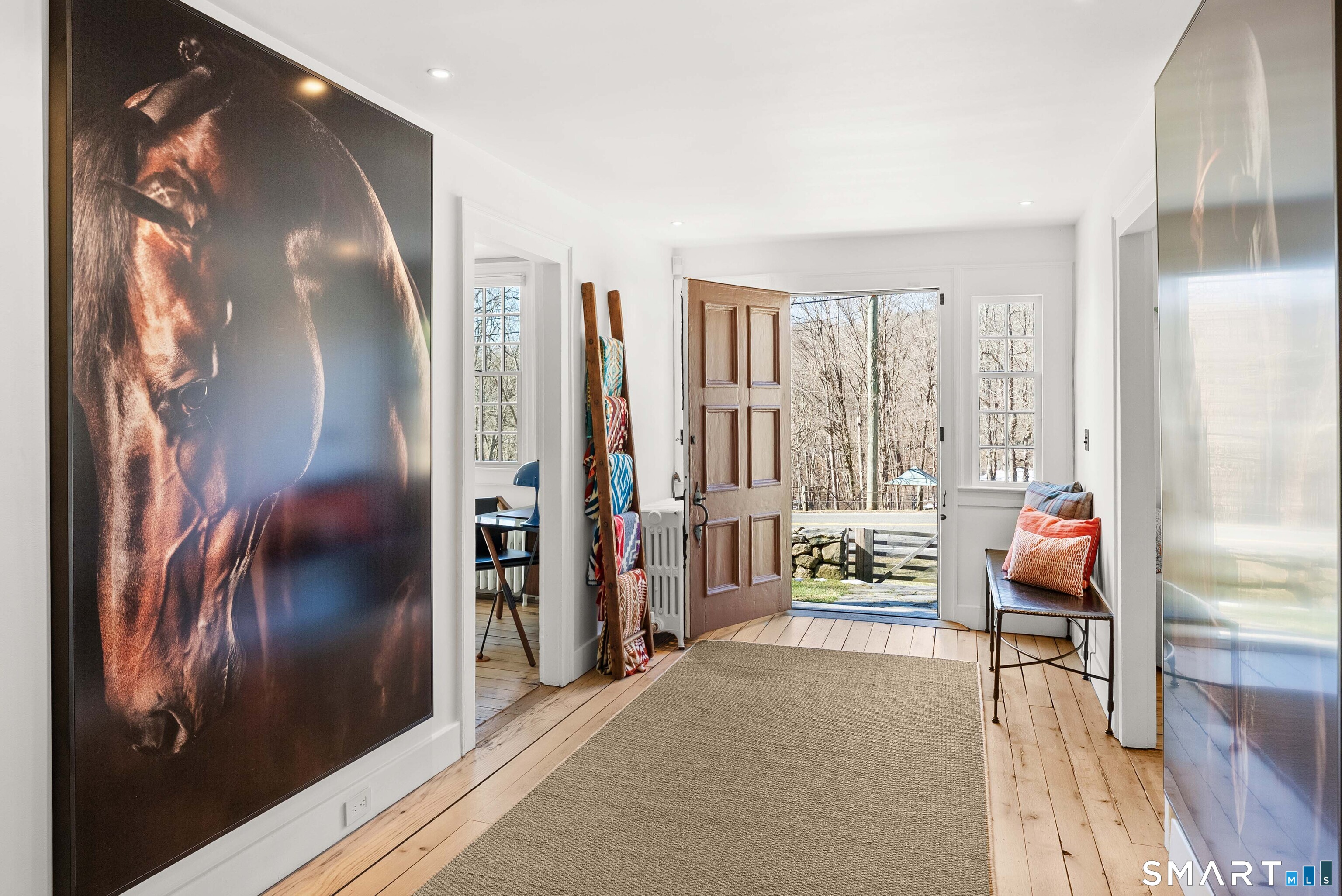 382 Weekeepeemee Road Woodbury, CT 06798 - Photo 3 of 40 a living room with furniture and large windows