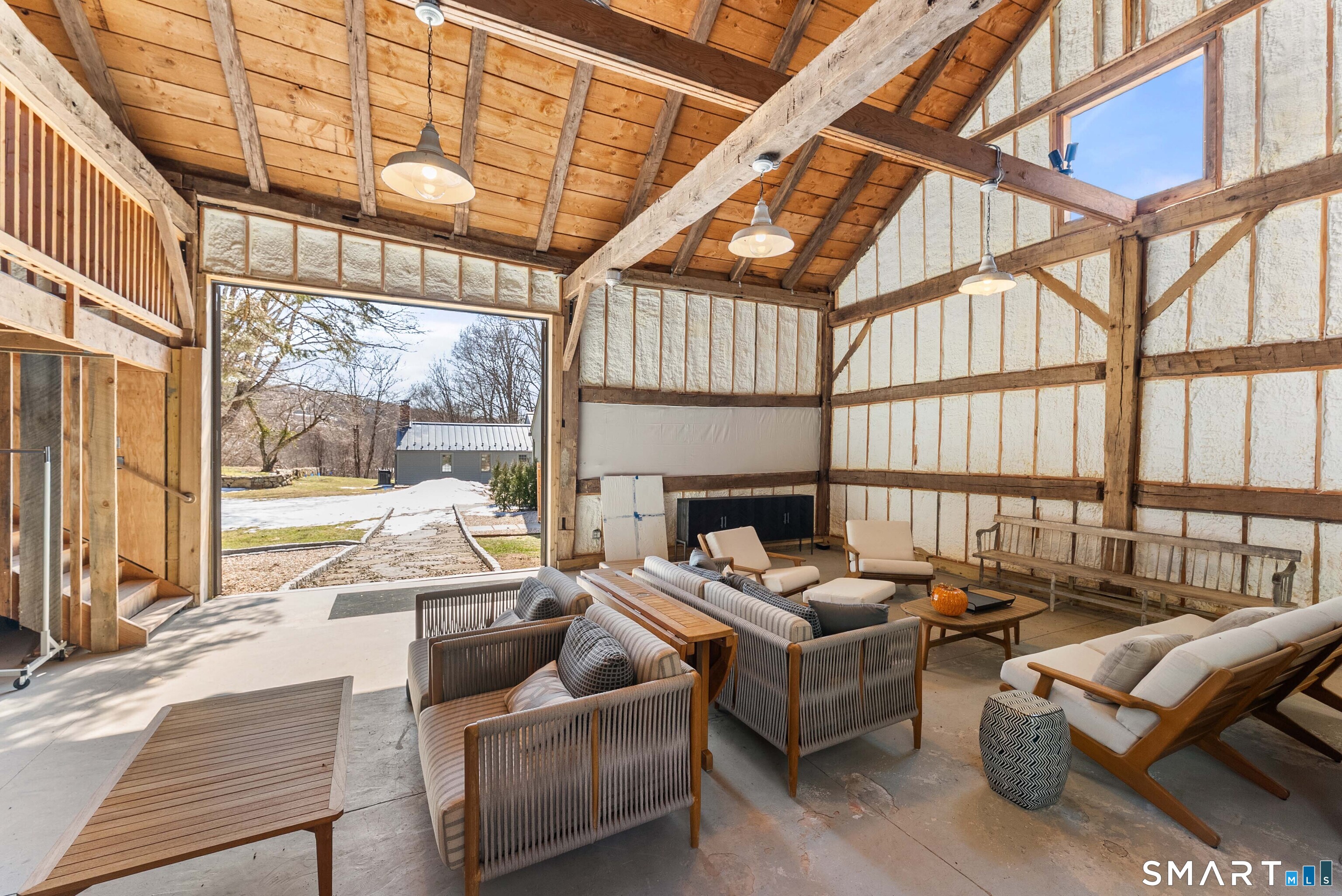 382 Weekeepeemee Road Woodbury, CT 06798 - Photo 36 of 40 a living room with furniture and a large window