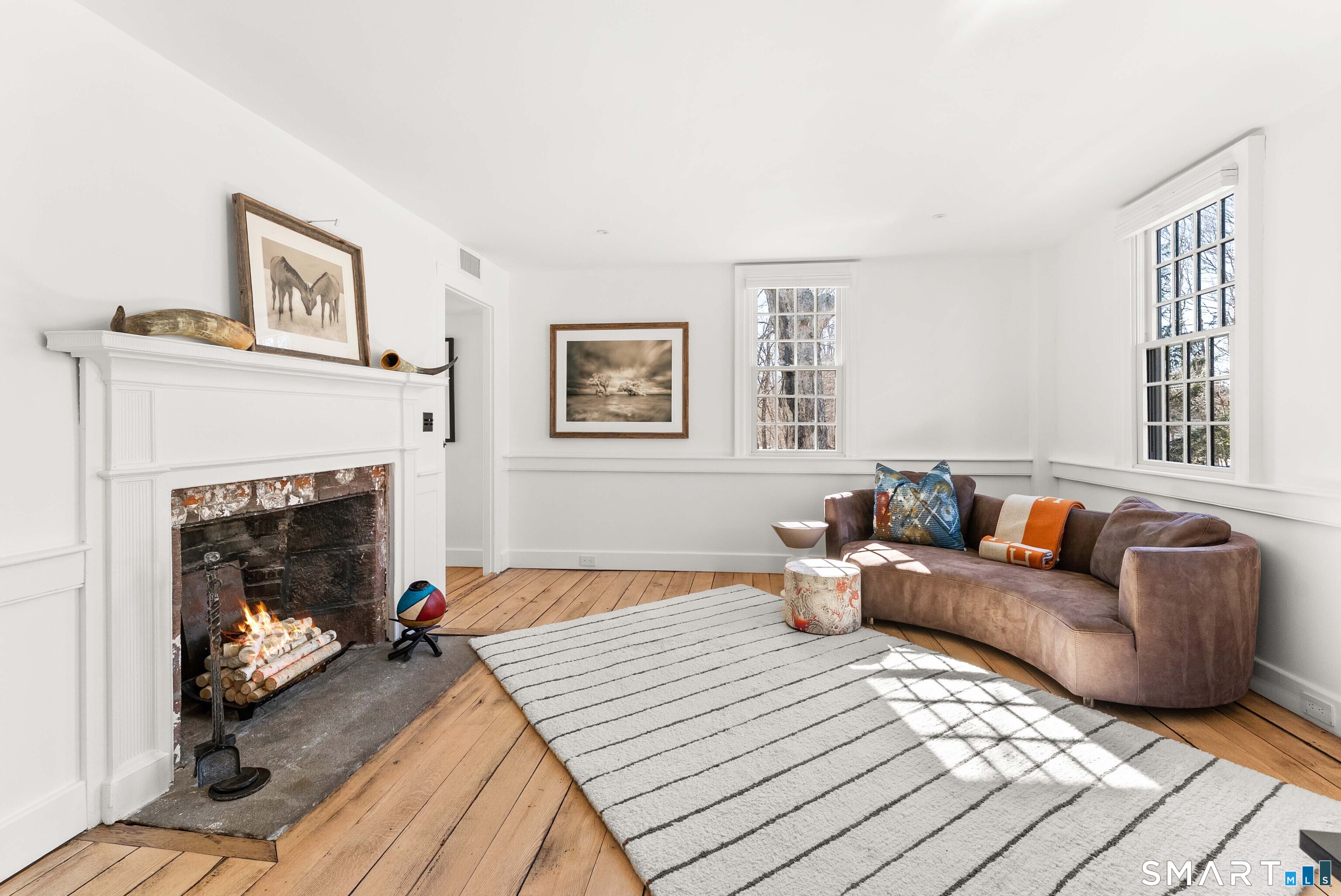 382 Weekeepeemee Road Woodbury, CT 06798 - Photo 4 of 40 a living room with furniture and a fireplace