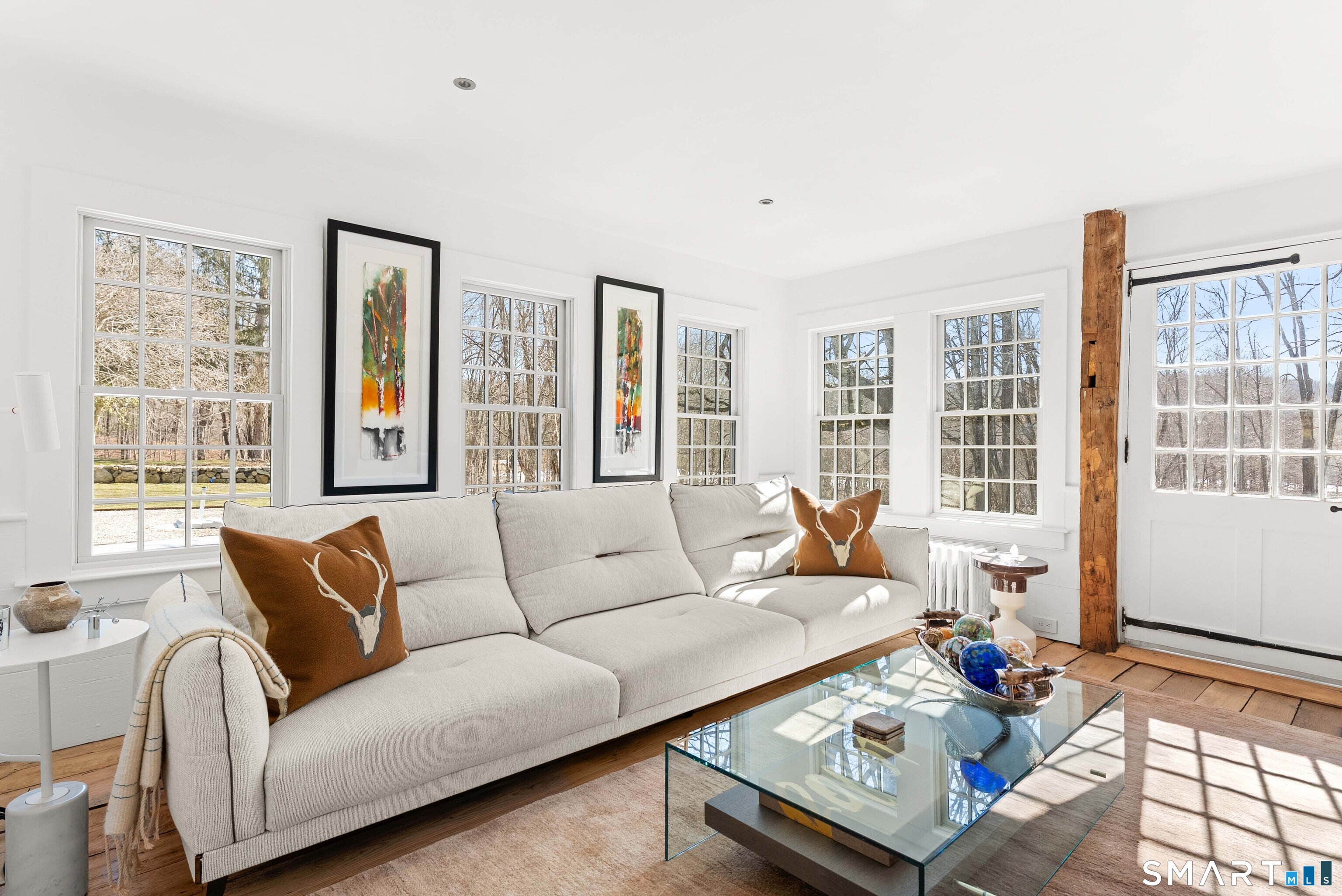 382 Weekeepeemee Road Woodbury, CT 06798 - Photo 7 of 40 a living room with furniture and large window