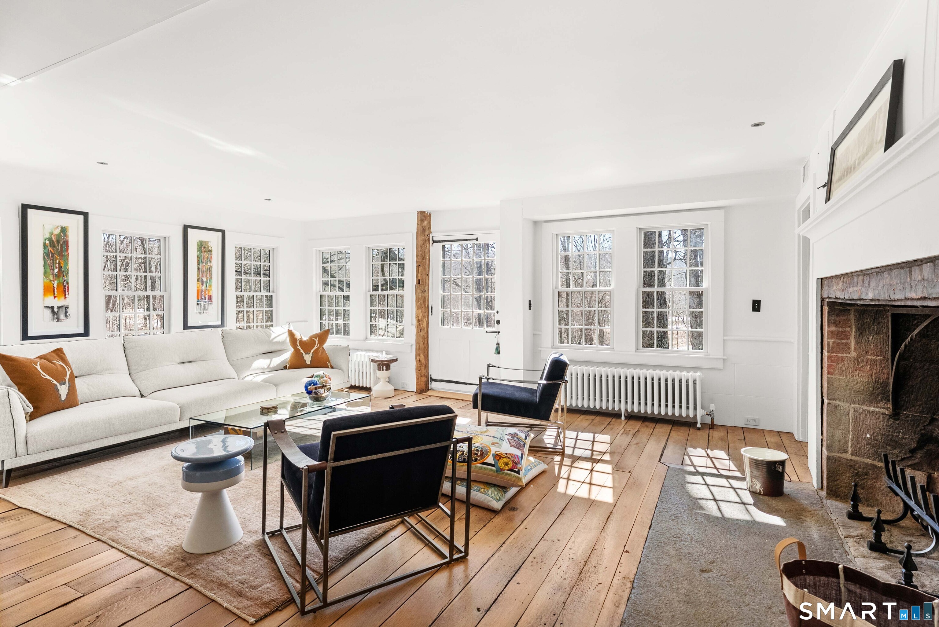 382 Weekeepeemee Road Woodbury, CT 06798 - Photo 8 of 40 a living room with furniture and a fireplace