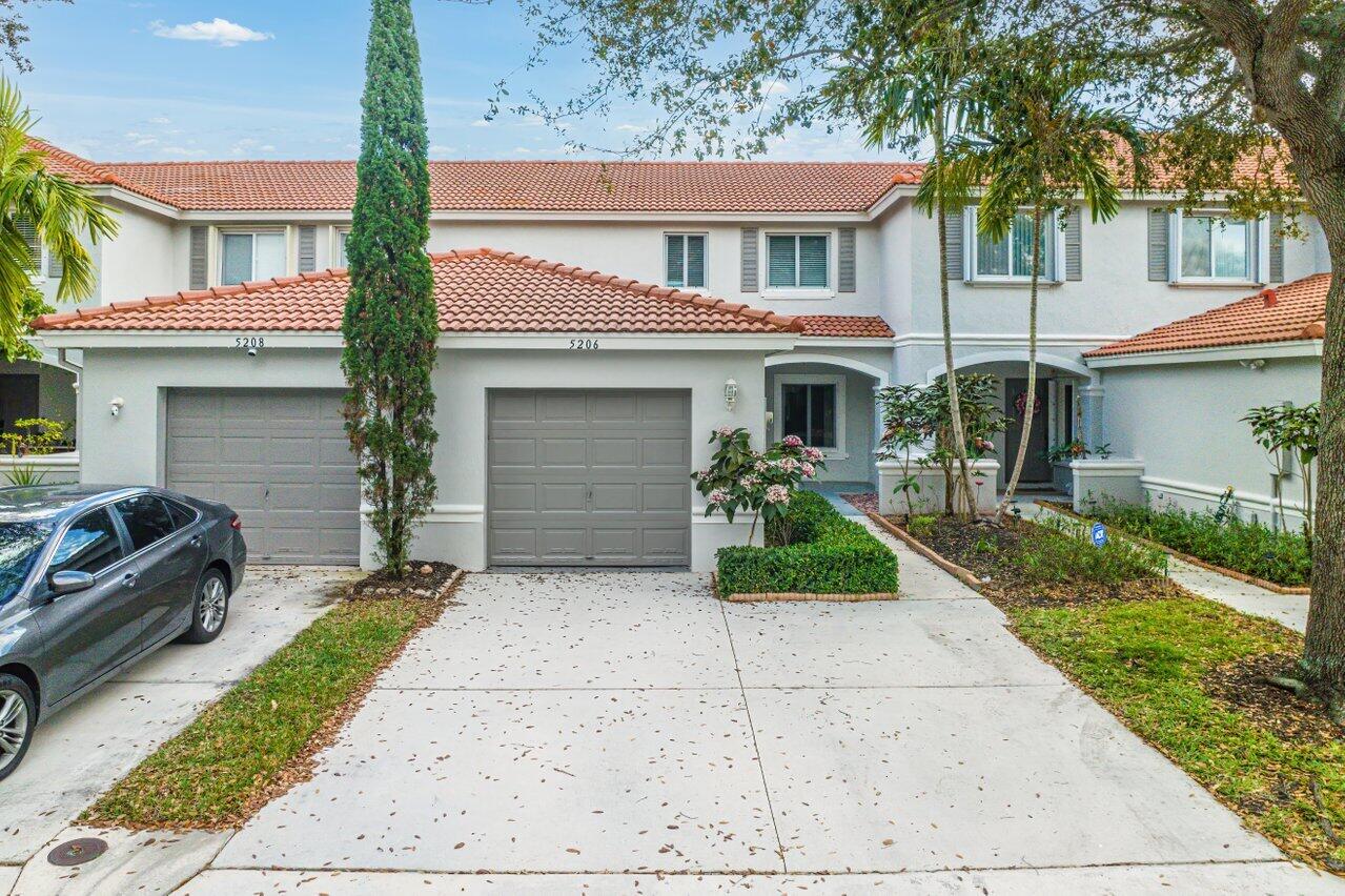 5206 Crossing Rocks Court Riviera Beach, FL 33407 - Photo 1 of 49 Exterior