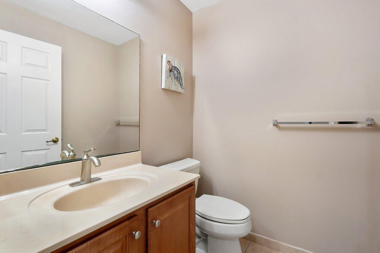 5206 Crossing Rocks Court Riviera Beach, FL 33407 - Photo 17 of 49 Half Bath