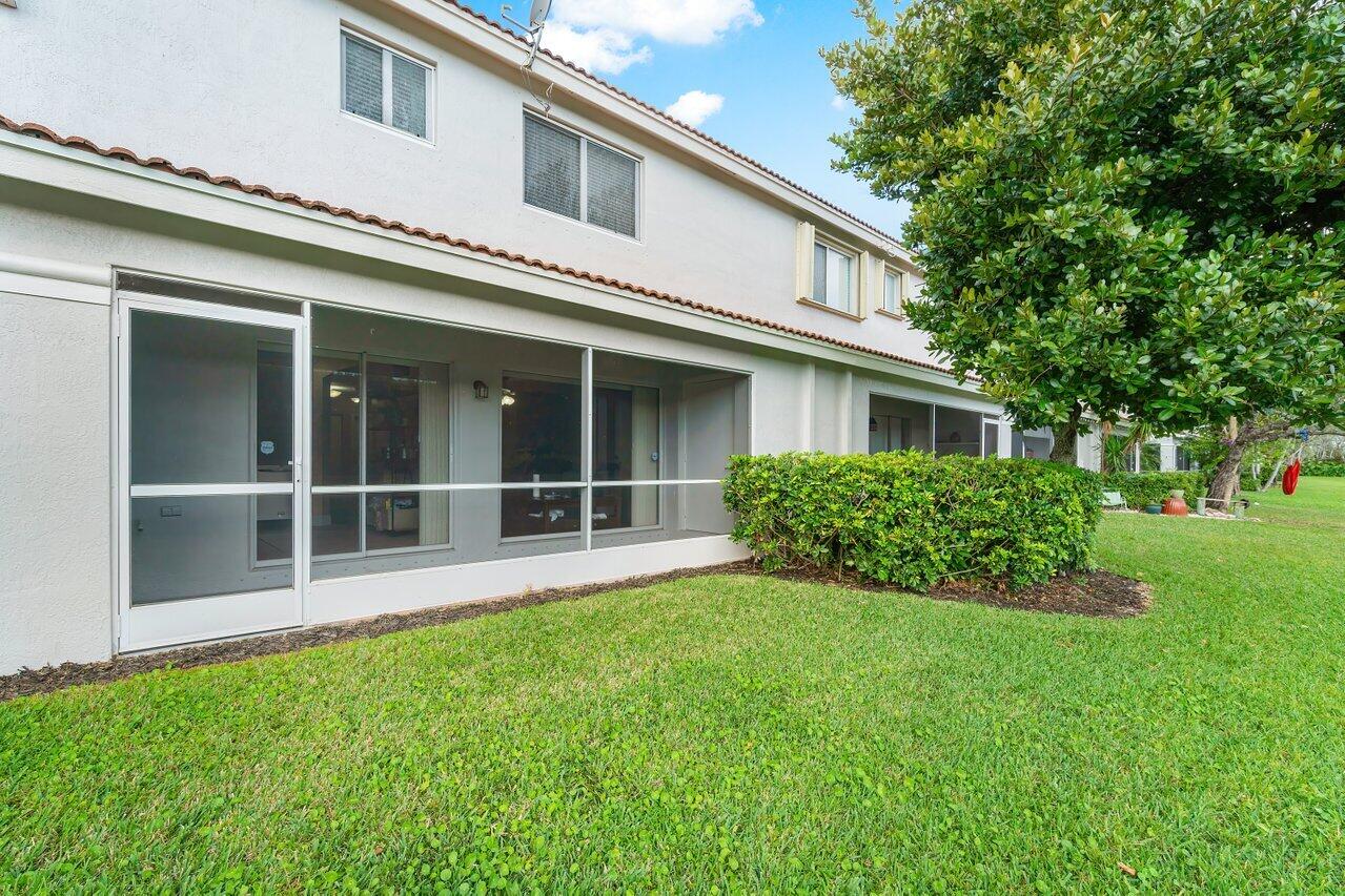 5206 Crossing Rocks Court Riviera Beach, FL 33407 - Photo 26 of 49 Back Exterior
