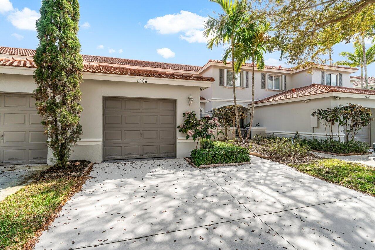 5206 Crossing Rocks Court Riviera Beach, FL 33407 - Photo 3 of 49 Garage/Driveway