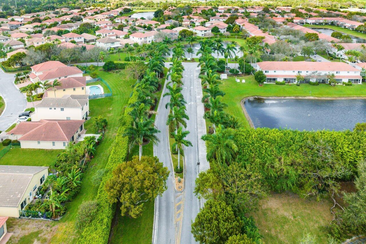 5206 Crossing Rocks Court Riviera Beach, FL 33407 - Photo 40 of 49 Gate Entrance