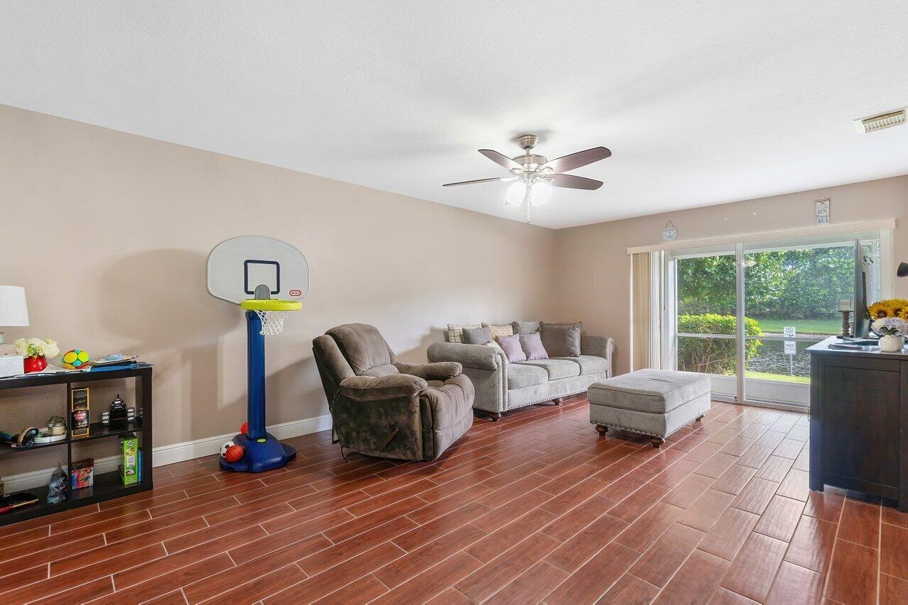 5206 Crossing Rocks Court Riviera Beach, FL 33407 - Photo 8 of 49 Living Room