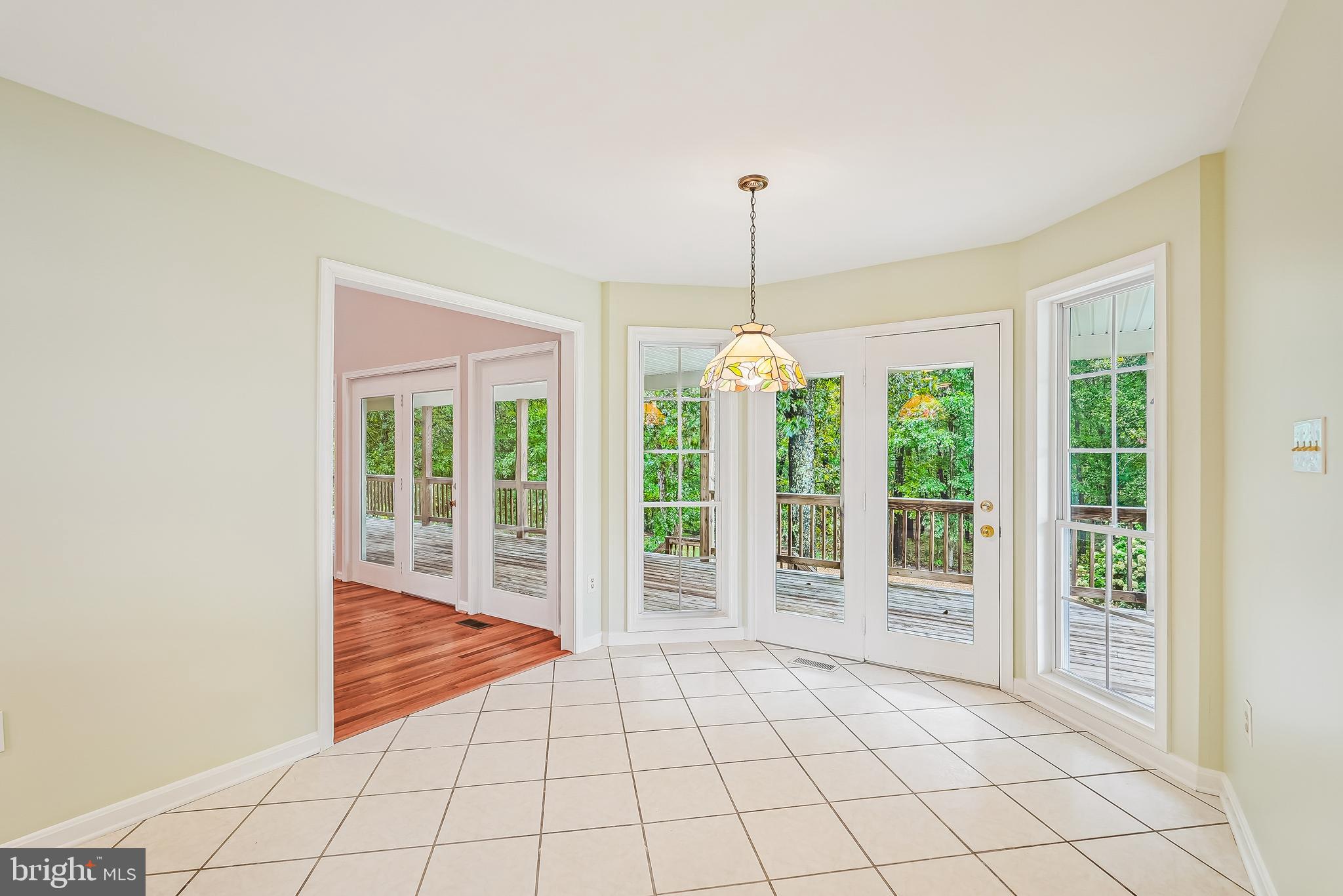 18 Hall Road Front Royal, VA 22630 - Photo 23 of 44 Large windows and door in kitchen area