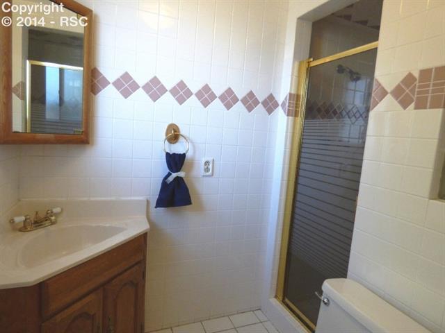 1556 Collins Road Colorado Springs, CO 80920 - Photo 20 of 25 Lower level 3/4 bath.