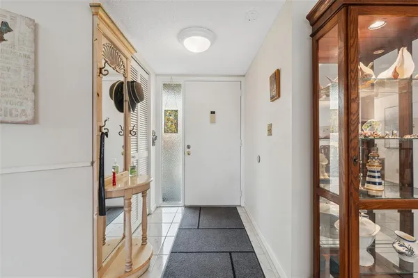 a view of a dining room with furniture and a livingroom