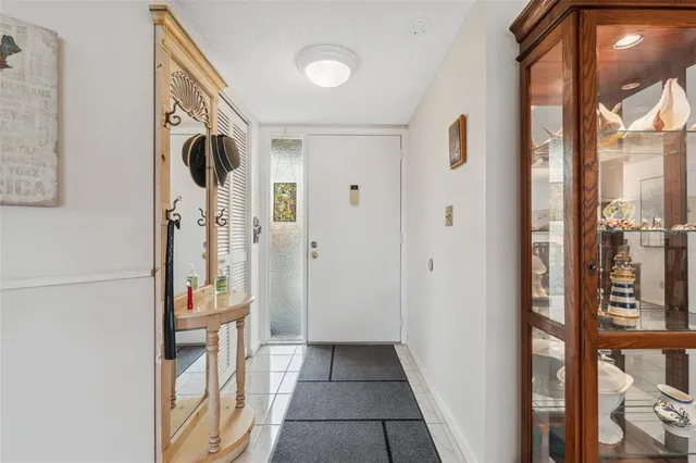 a view of a dining room with furniture and a livingroom