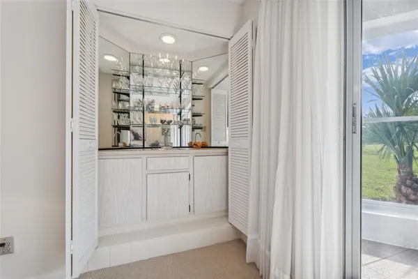 a view of a lake with a yard