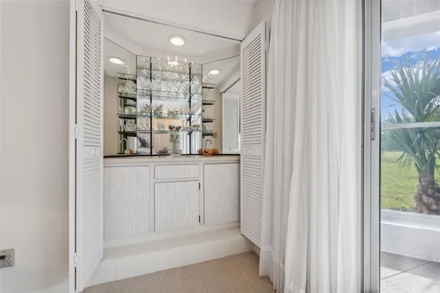 a view of a lake with a yard