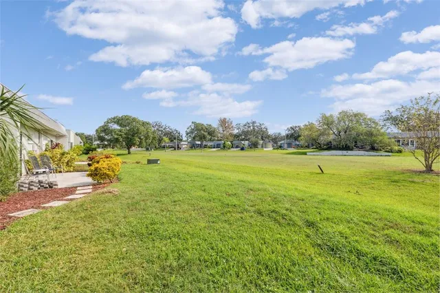 a view of a golf course with a garden