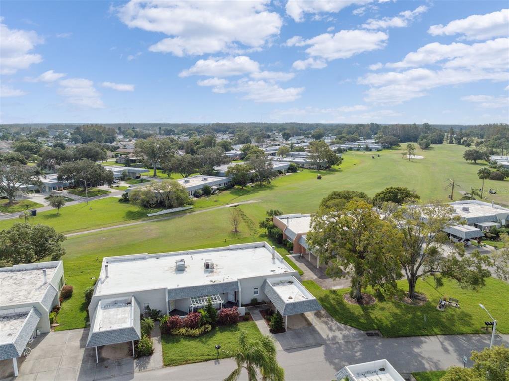 3942 Trophy Boulevard New Port Richey, FL 34655 - Photo 46 of 78 an aerial view of a house with a lake view