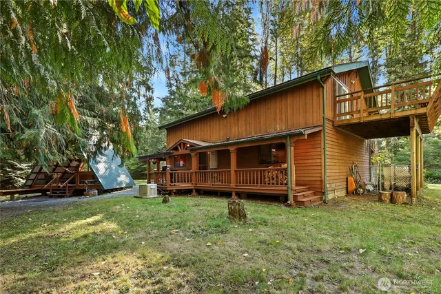 an aerial view of a house with swimming pool