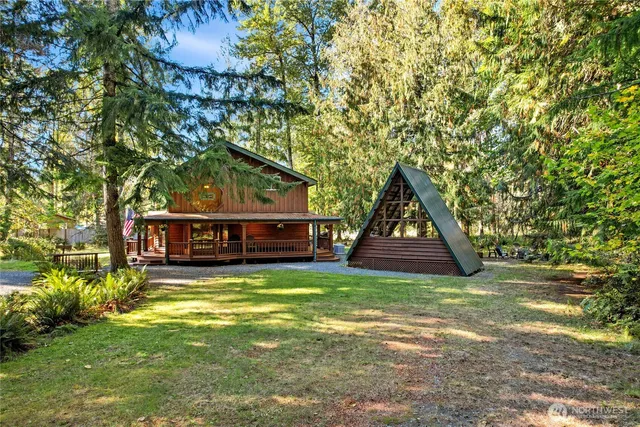 a backyard of a house with lots of green space