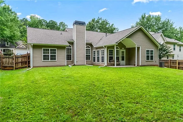 front view of a house with a yard