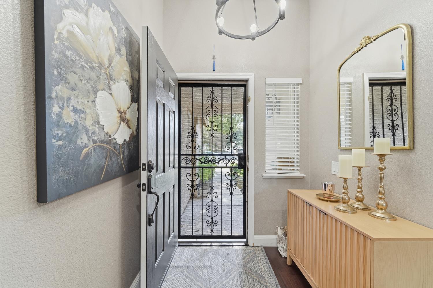 2220 Ellison Drive Modesto, CA 95355 - Photo 4 of 53 a bathroom with a sink and a mirror