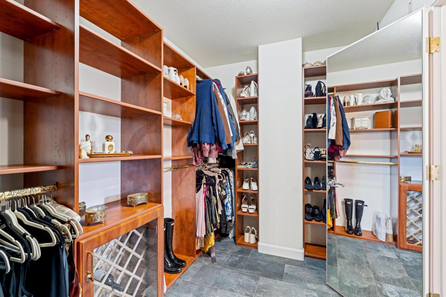 426 South Highland Avenue Ripon, CA 95366 - Photo 63 of 82 a view of walk in closet with clothes and shoes