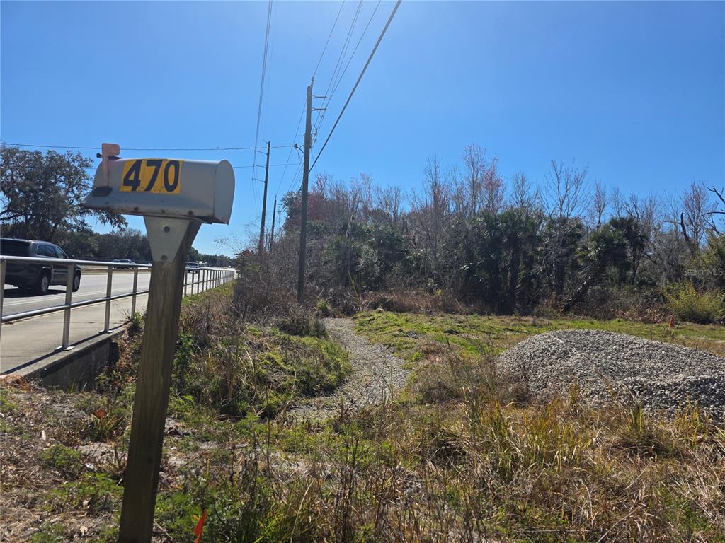 470 State Rte 415 Osteen, FL 32764 - Photo 3 of 8 a view of outdoor space and yard