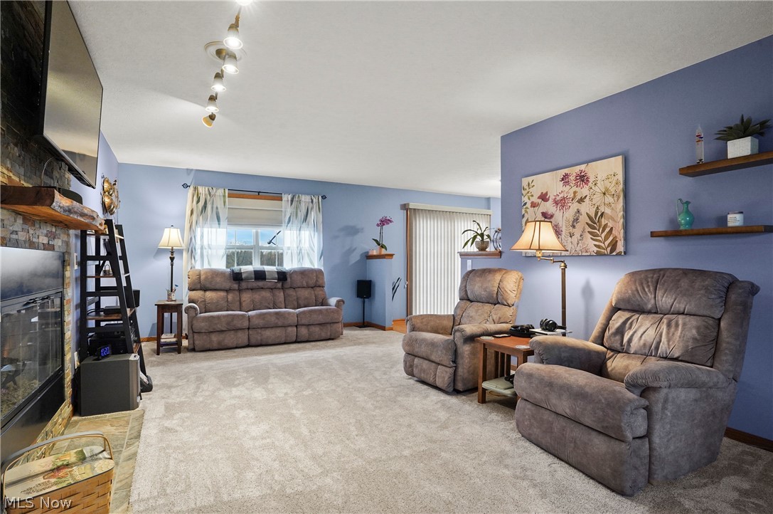 1825 New Milford Road Atwater, OH 44201 - Photo 10 of 34 Living room with new carpet