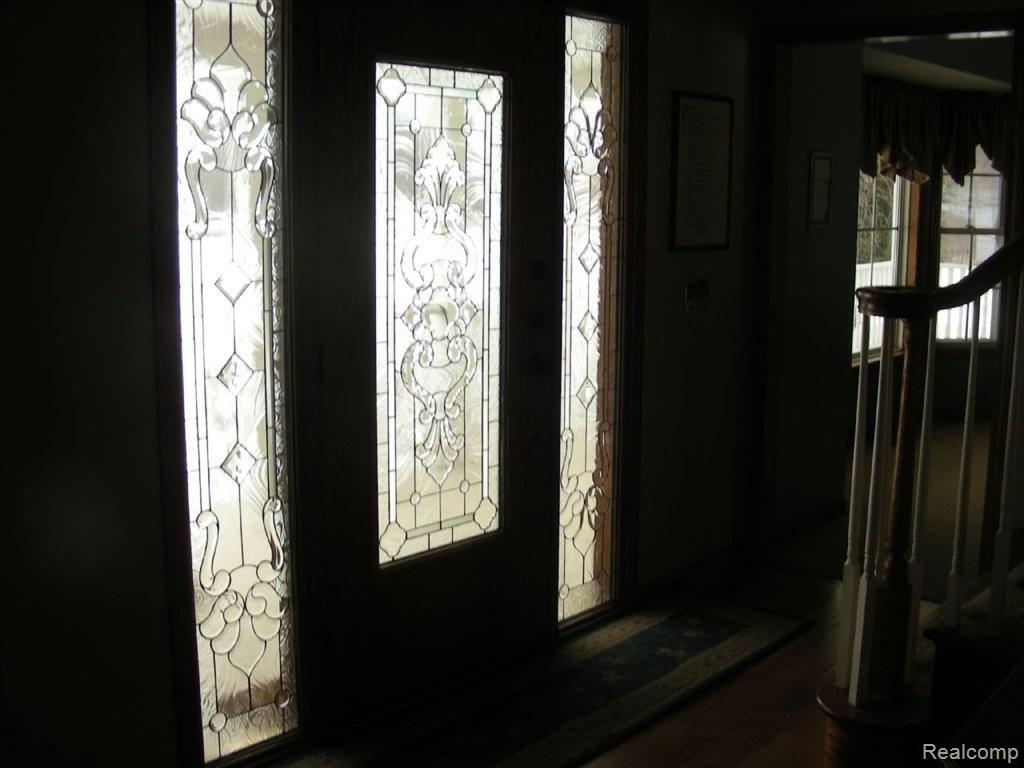 2740 North Burkhart Road Howell, MI 48855 - Photo 4 of 25 Leaded glass door