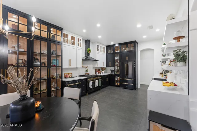a bathroom with a shower and a sink