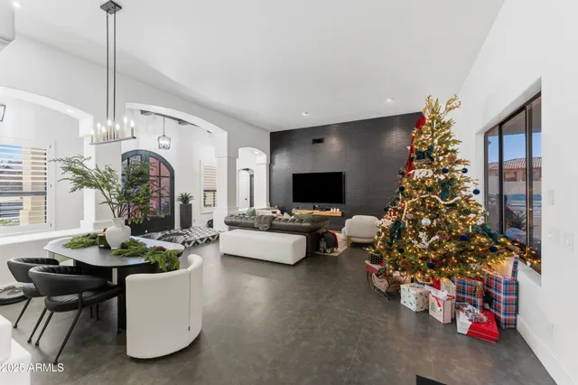 a bathroom with cabinets and mirror