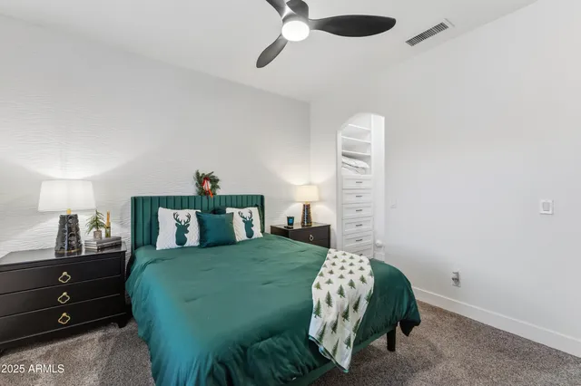 a view of a hallway with windows and entryway