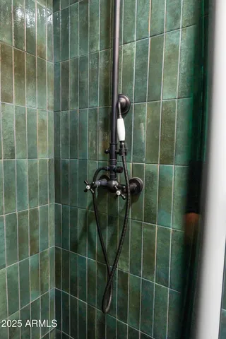 a living room with furniture ceiling fan and a rug